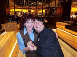 Nancy Thayer posing with a reader.