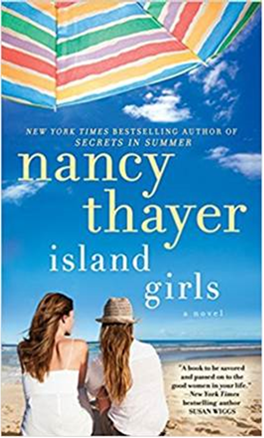 image001 Cover of island Girls. Two women sitting on a beach under a colorful umbrella.