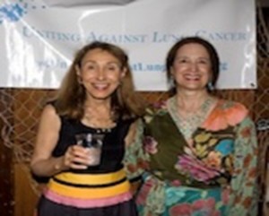 two women at an event.